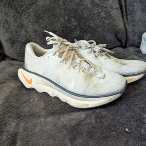 Nike Running Shoes with Orange Accent